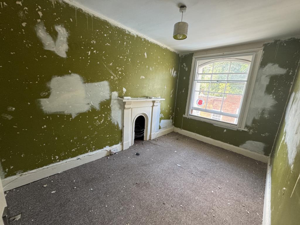 Lot: 58 - THREE STOREY TERRACED HOUSE FOR IMPROVEMENT - View of bedroom 2 on the second floor